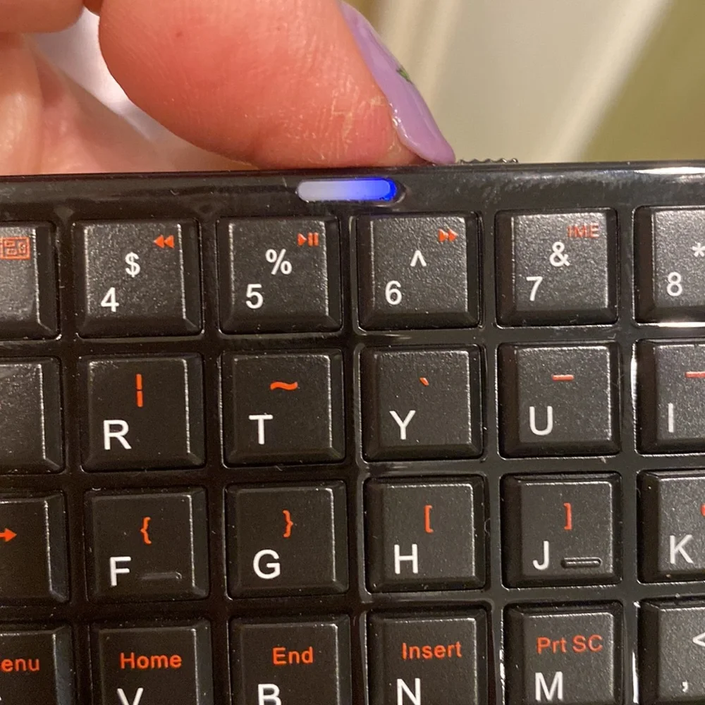 Mini Wireless Bluetooth Keyboard
